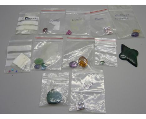 Unmounted gemstones including diamond, ruby, amethyst, etc. 