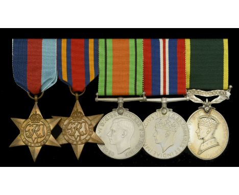 Five: Colour Sergeant H. J. Dovell, Devonshire Regiment who, having completed the Commando Training Course at Lochailort, was