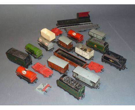 A box of Hornby Dublo and Triang rolling stock including Royal Esso daylight tank wagon and other wagons 