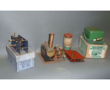 A boxed Meccano electric motor No. E6, a boxed Meccano transformer No. T6 and a unboxed Meccano live steam engine