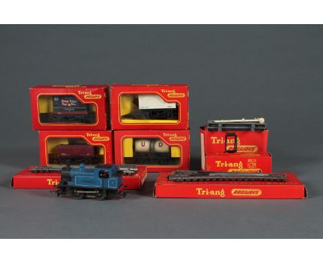 A collection of 8 boxed Triang Railways models; Left hand point (R.490), Right hand point (R.491), goods truck (R.112), Quart