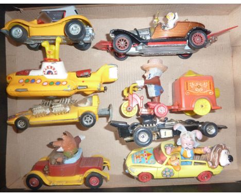 A collection of film related Corgi and Dinky vehicles: Chitty Chitty Bang Bang car, The Beatles Yellow Submarine, Magic Round