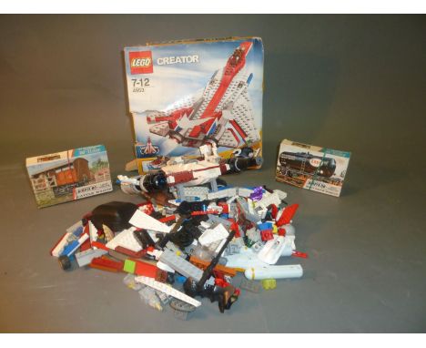 A boxed Lego creator (4953) Fast Flyer and 2 00 scale Airfix construction kits (Esso Tank Wagon and Cattle Wagon) 