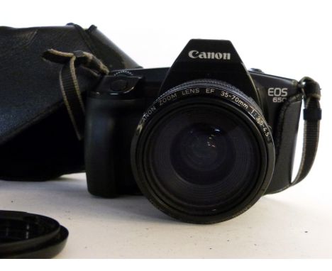 Canon EOS 650 film camera together with Canon zoom lens EF35-70mm lens