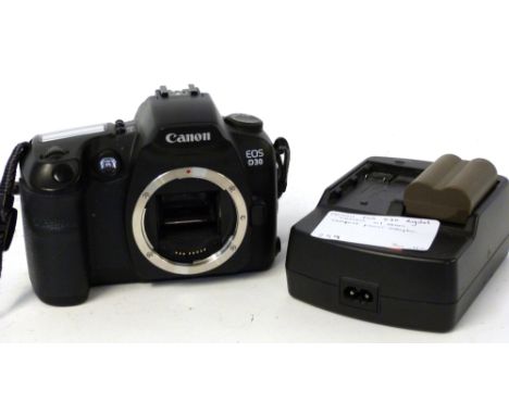 Canon EOS D30 digital camera with Canon compact power adapter