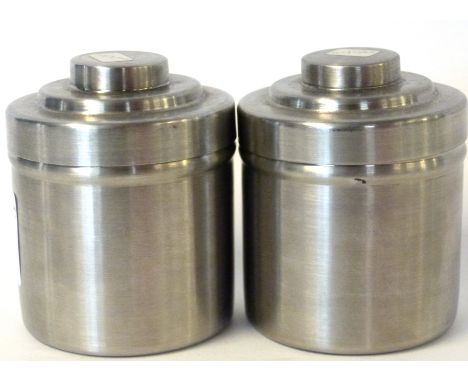 Pair of film developing canisters