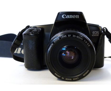 Canon EOS 1000F film camera together with Canon zoom lens EF35-80mm