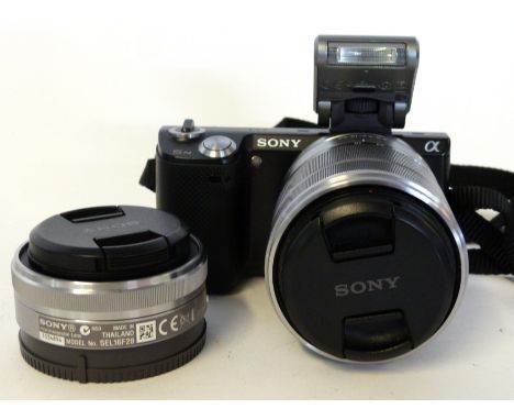 Sony NEX-5N digital camera plus a Sony 18-55mm lens plus a Sony 2.8/16 lens, and charger and manual