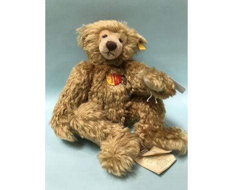 A Steiff 'Snobby' Teddy Bear, with yellow tag, number 028267, golden mohair, with chest tag and swing label, 35cm tall