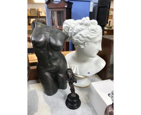 A model of a torso, a bust and a model of Spirit of Ecstasy