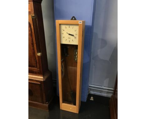 A gents electric regulator wall clock