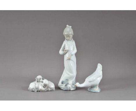 Two Nao porcelain figurines,  one of a girl, 26cm high, the other a goose, together with a Royal Copenhagen figural group of 