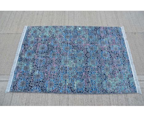 A modern carpet, 230cm x 160cm