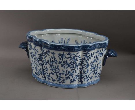 An Ironstone China twin handled shaped planter, with floral scrolling design, fish to the inside, 23cm H x 53cm WCrazed throu
