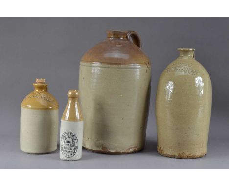 Three stoneware storage jars, the largest unnamed, 40cm high, one named M. Crew of Portadown, a smaller jar by Collingwood, t