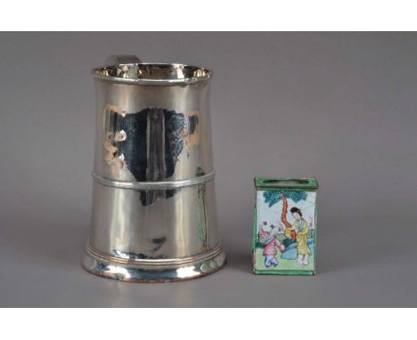 A 19th century silver plated tankard, by N. Smith & Co., with a crest to the front, the handle appears to have been damaged a