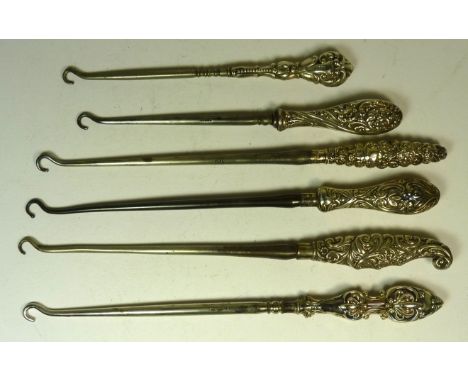 Six Victorian and Edwardian button hooks with decorative silver handles (6)