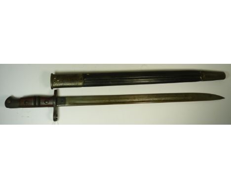 A Remington 1913 Bayonet with grooved wood grip, marked on the ricasso and with steel mounted leather scabbard, blade 43.5cms