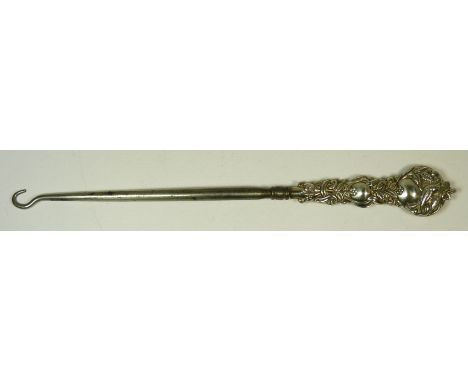 An Edwardian silver handled button hook, the decorative handle embossed with bird, flower and foliage to each side, Birmingha