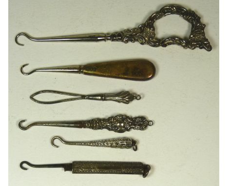 A late Victorian button hook with decorative silver handle, Birmingham 1900; a small folding button hook with silver handle; 