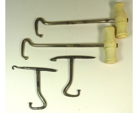 An all metal folding combined boot pull/button hook; an all metal folding boot pull with turned screw type end and a pair of 