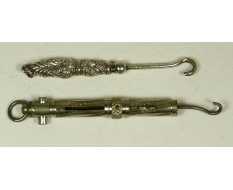 A small late 19th Century telescopic button hook in white metal case with slider band and set with a Stanhope lens "A Memory 