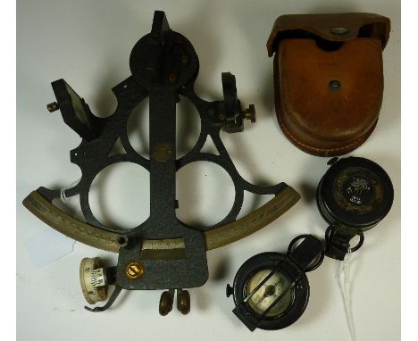 A Husun sextant with black metal frame, silvered brass scale (lacks eyepiece); a marching compass and another marching compas