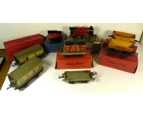 HORNBY - clockwork M1/2 0-4-0 loco and tender, boxed; Flat Truck with Container, boxed; no1 Side Tipping Wagon, boxed; No.0 R