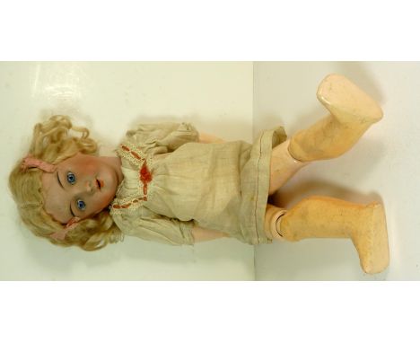 A German made bisque socket head doll impressed Germany 01/4 with blond wig, sleeping blue glass eyes, open mouth with teeth 