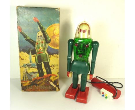 A DUX ASTROMAN (West Germany) battery operated remote control plastic Robot in original box, c.1960's. Green and red plastic 