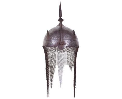 Persian Qajar Helmet Kulah Khud, 19th century, bowl fitted with a sliding nasal bar secured by a thumb screw, a pair of plume