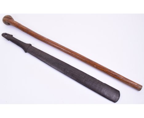 New Caledonian Palmwood Club of ‘Sword’ Form, some carving to front of blade, pommel pierced, 31”; and an unusually stout wal
