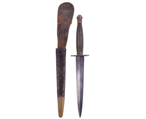 3rd Pattern Fairbairn Sykes Commando Knife, blackened ribbed handle with brass top nut, oval cross guard stamped “WILLIAM ROD
