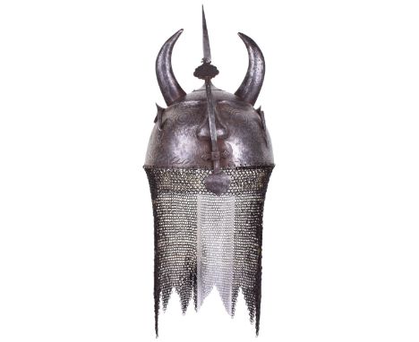 Large Heavy Persian Qajar Helmet Kulah Khud, 19th century, iron bowl embossed with a stylised face, and fitted with a pair of