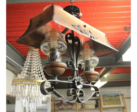 A Dutch wrought iron and copper oil lamp style light fitting