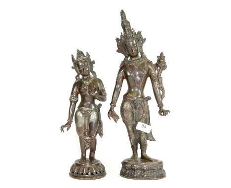 2 Tibetan cast bronze figures of female Buddhist Deities, H 43cm & 33cm