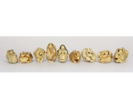 9 carved vegetable "ivory" netsuke with black onyx eyes