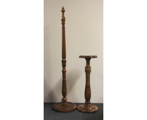 An attractive standard lamp and a pine plant stand