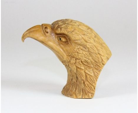 A signed carved fruitwood eagles head netsuke, H 5cm