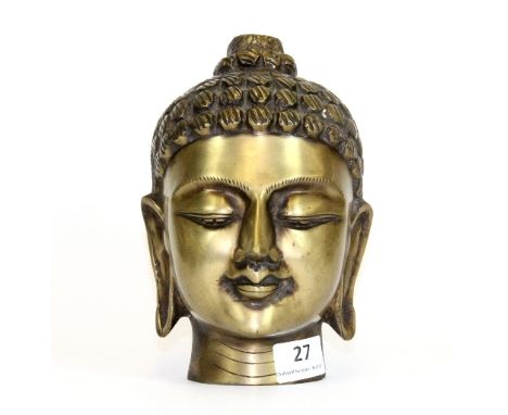 A brass/bronze Buddha head, H 19cm