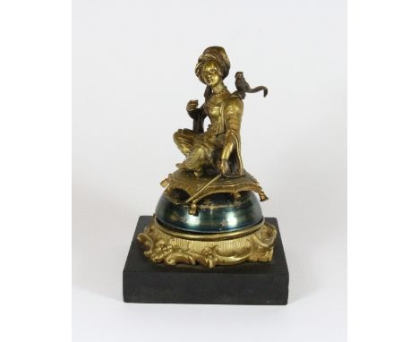 Late 18thC Continental gilt bronze bell in an Orientalist style on a black marble base. Height 17cms.