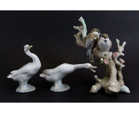 A Lladro bird on branch figure (H 18cm) together with 2 Lladro geese