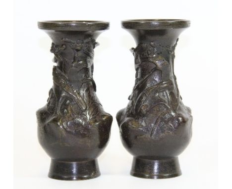 A pair of 19th century Japanese bronze vases decorated with birds among foliage, H 15cm