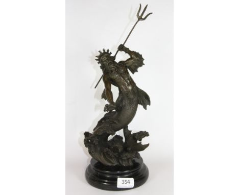 A bronze figure of Poseidon on a black marble base, H 40cm