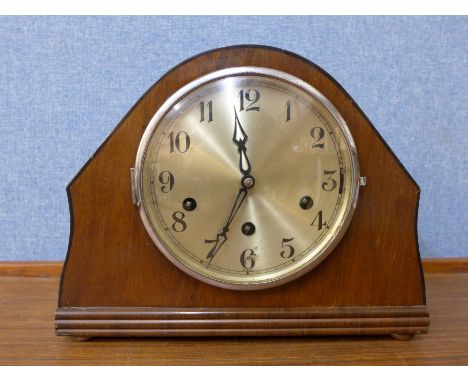 An oak mantel clock