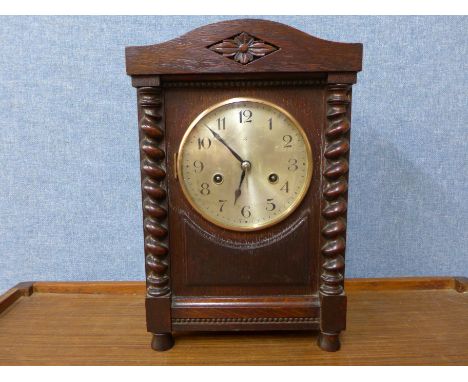 An oak barleytwist mantel clock