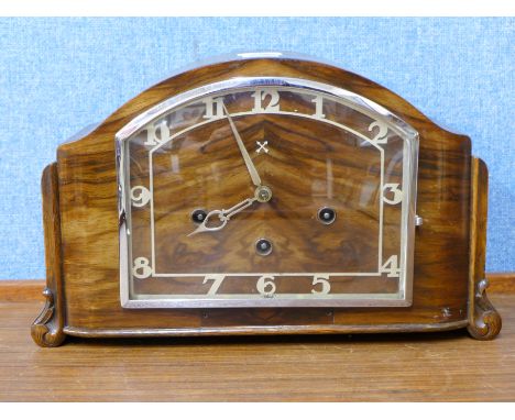 A walnut mantel clock and aneroid barometer