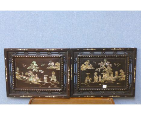 A pair of Chinese mother of pearl inlaid hardwood panels