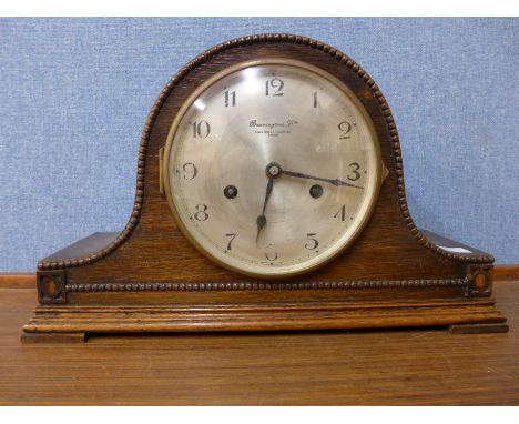 A Bravingtons oak mantel clock