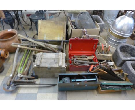 A large quantity of tools including cast iron water pump, pulleys, wooden boxes, clamp and axes, etc.